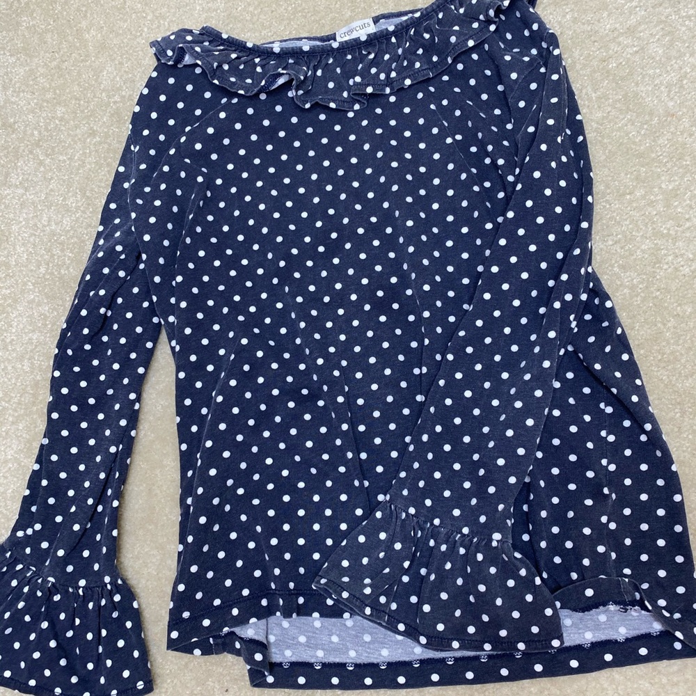 Navy white polka dot top with ruffle